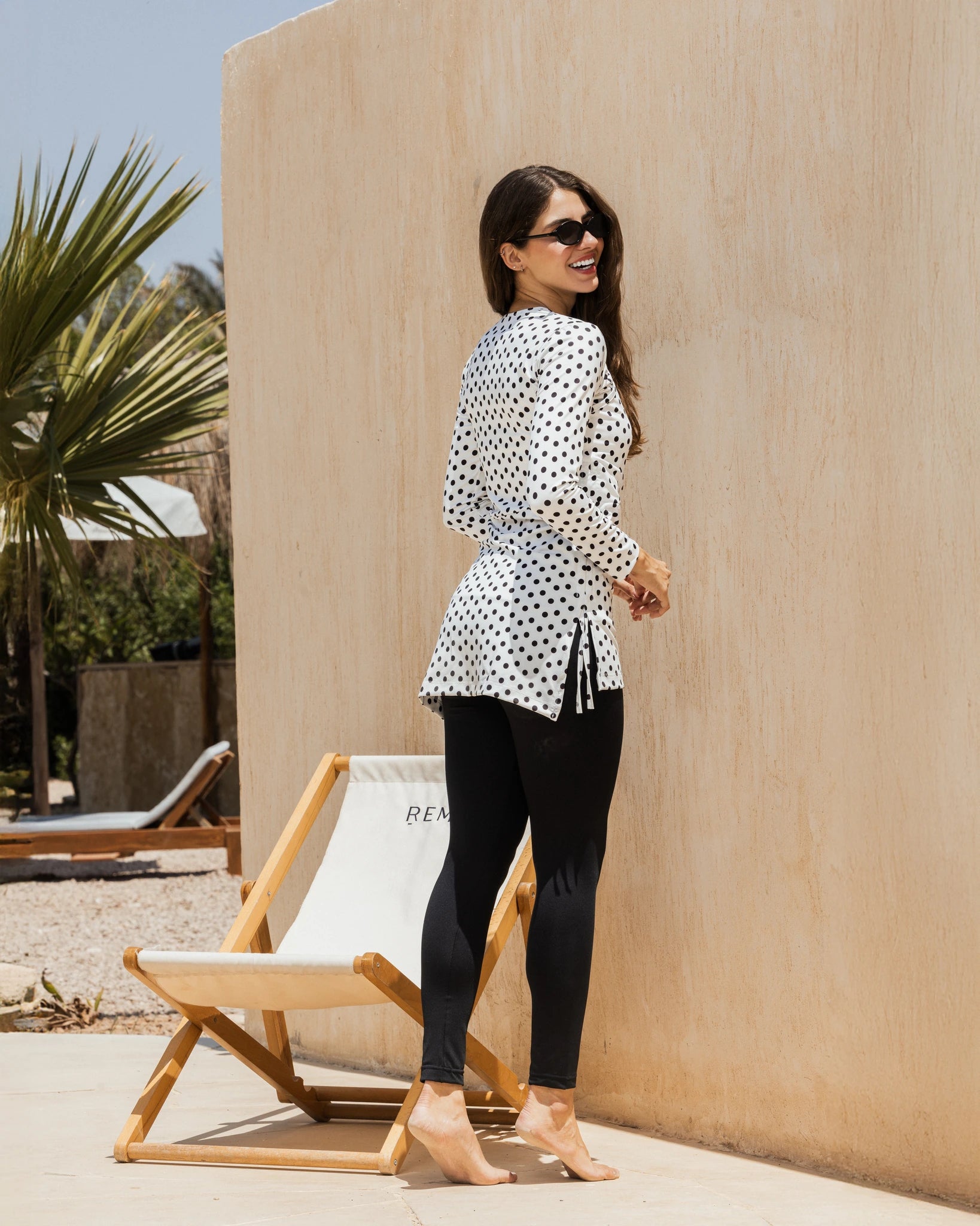 Ivory polka dot modest swim set back view full coverage swimwear